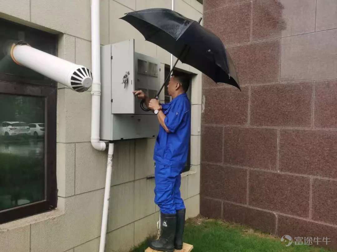 The staff carefully investigated the electric box